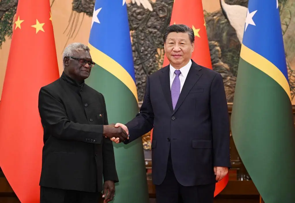 PM Manasseh Sogavare with Chinese President Xi Jinping during a recent visit to Beijing.