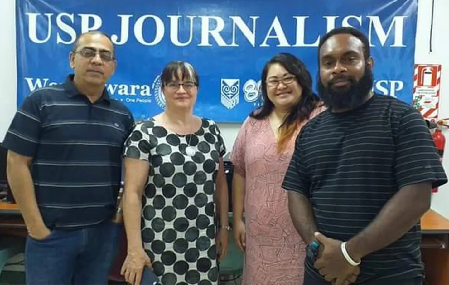 Associate Professor in Pacific Journalism at the School of Pacific Arts, Communication, and Education (SPACE), Shailendra Singh with Journalism teaching assistants.
