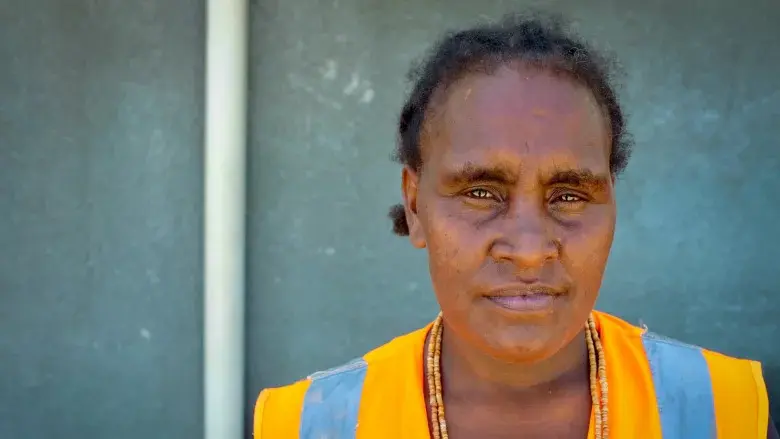 Mary Solo is a CAUSE participant who uses income from the work to build a small business while paying for her children’s school fees.