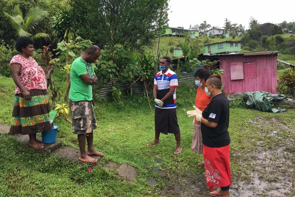 Caption: Social Empowerment and Education Programme (SEEP) staff raising awareness on COVID-19 in communities.