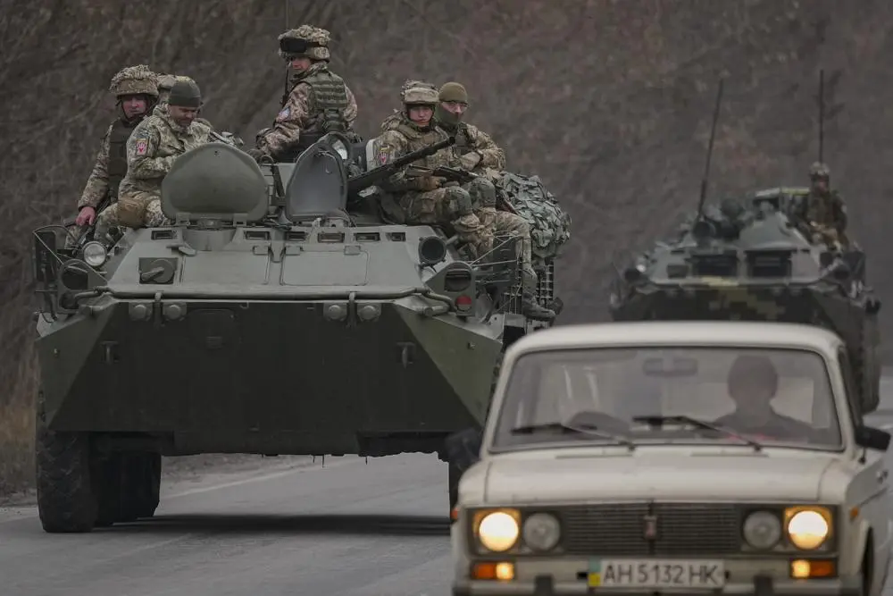 Russian President Vladimir Putin threatened any country trying to interfere with “consequences you have never seen,” as a once-hoped for diplomatic resolution now appeared impossible.