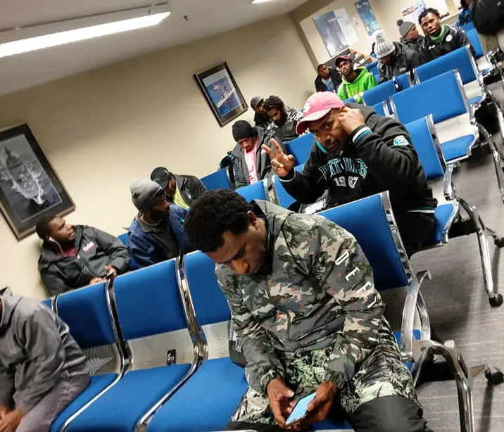 Seasonal workers waiting for their repatriation flight from New Zealand.