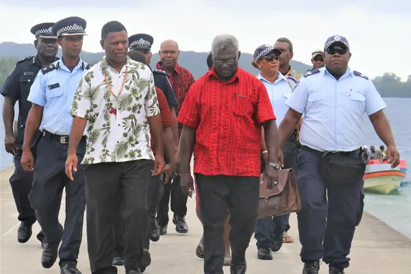 Prime Minister is escorted by GP Deputy Premier on arrival at Marau sound.