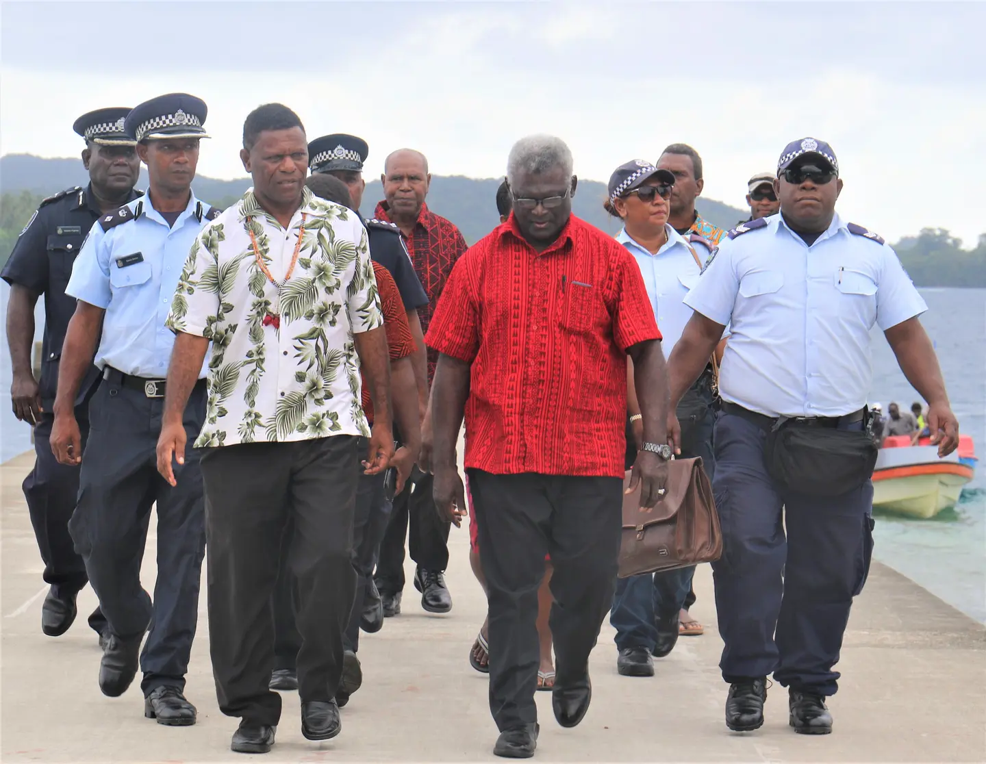 Prime Minister is escorted by GP Deputy Premier on arrival at Marau sound.
