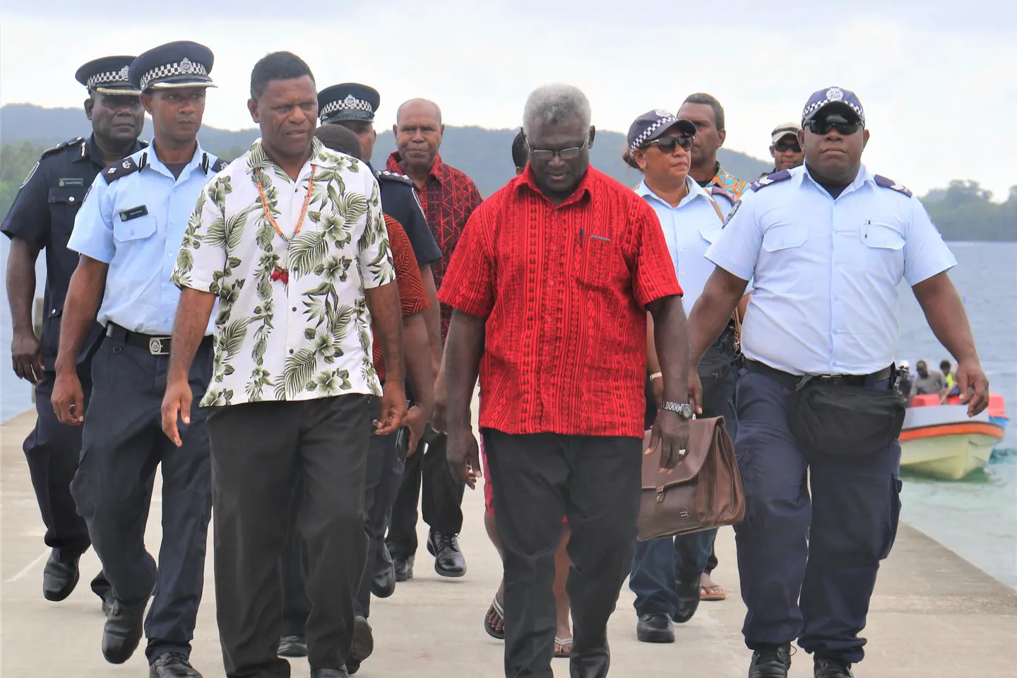 Prime Minister is escorted by GP Deputy Premier on arrival at Marau sound.