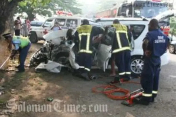 The Police Fire Rescue Team, while attempting to free the female passenger.