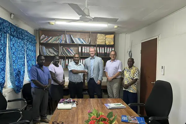 L-R Dr Gregory Jilini Deputy Secretary Health Care, Health PS Mrs. Pauline McNeil, Health Minister Dr Culwick Togamana and Australia High Commissioner to SI Mr. Rod Hilton shaking hands, Counsellor Human Development, Mr Mika Kontiainen and Director Policy and Planning Mr. Ivan Ghemu.