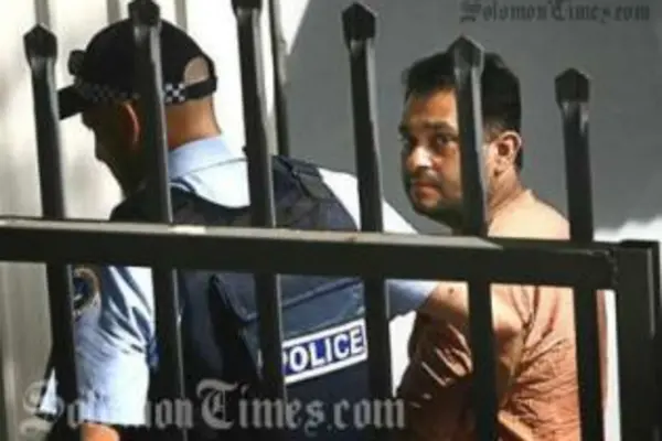 Julian Moti, during his arrest in the Solomon Islands.