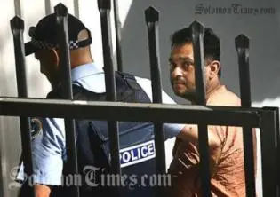 Julian Moti, during his arrest in the Solomon Islands.