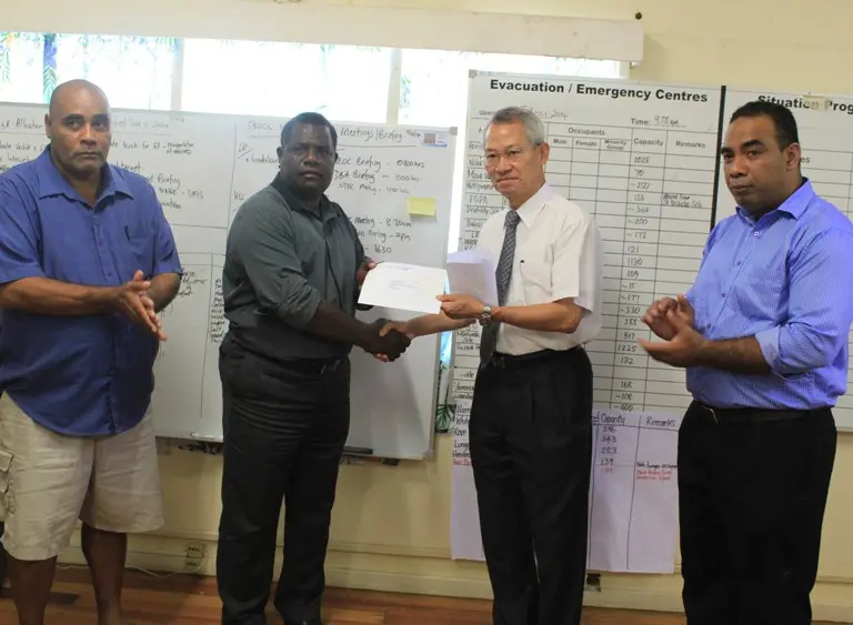 L-R, NDMO Director Loti Yates, Minister Tovosia, Ambassador Yu and Permanent Secretary Dr Melchior Mataki at the handover ceremony this afternoon.