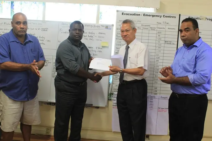 L-R, NDMO Director Loti Yates, Minister Tovosia, Ambassador Yu and Permanent Secretary Dr Melchior Mataki at the handover ceremony this afternoon.