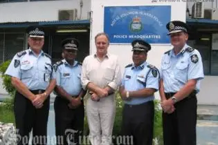PPF Commander Denis McDermott, Acting Deputy Commissioner Edmund Sikua, Minister for Home Affairs Bob Debus and Acting Commissioner Walter Kola with AFP Assistant Commissioner Frank Prendergast.