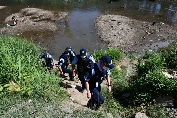AFP officers serving under SIAF and RSIPF officers during their joint foot patrol at Koa Hill community.