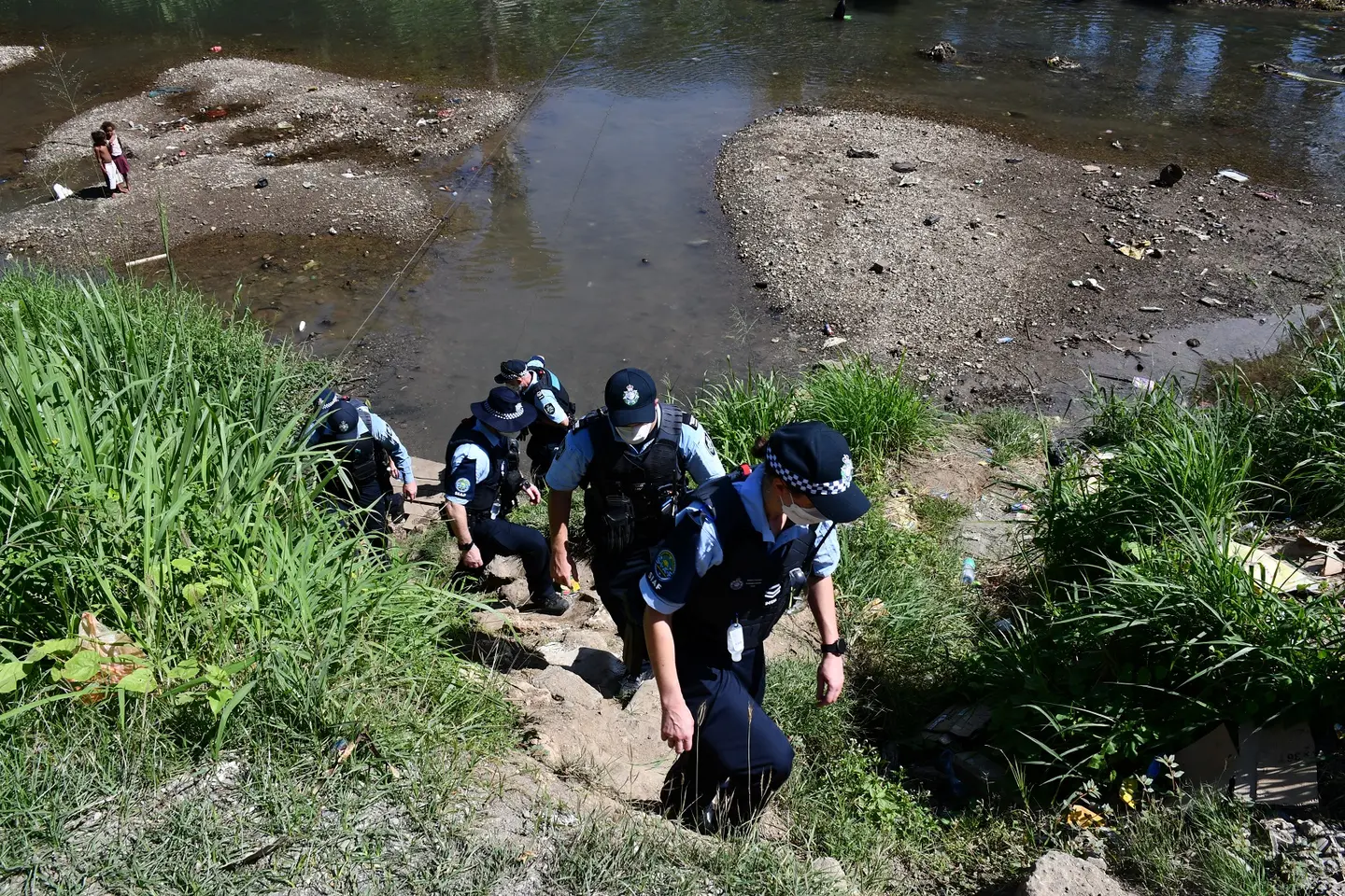 AFP officers serving under SIAF and RSIPF officers during their joint foot patrol at Koa Hill community.