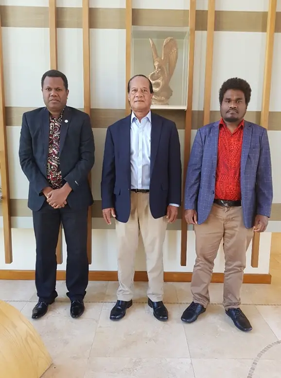 High Commissioner Robert Sisilo receiving the two Immigration officials at the High Commission in Canberra.
