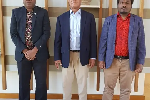 High Commissioner Robert Sisilo receiving the two Immigration officials at the High Commission in Canberra.