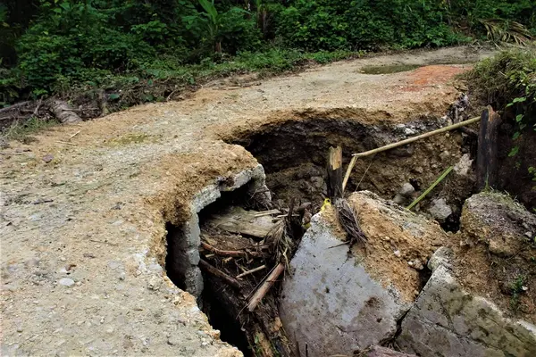 In most crossings the circular culverts that hold up the bridges have collapsed, making them dangerous for vehicles and pedestrians alike.