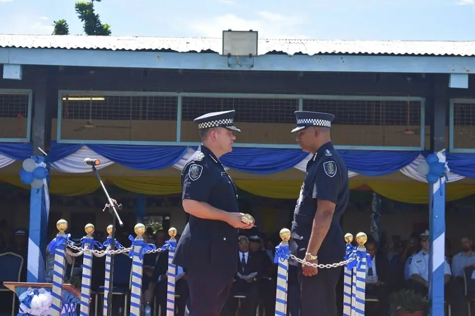 Outgoing Police Commissioner Varley handed the ‘sword’ over to Acting Commissioner of Police, Mostyn Mangau.