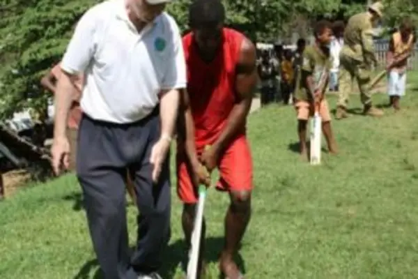 S.I Cricket Association member, Mr. Graeme Wilson during a cricket lesson.