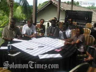 The Solomon Island delegation in discussion during the workshop.