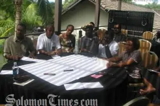 The Solomon Island delegation in discussion during the workshop.