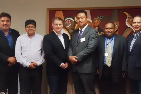 Hon. Clay Forau and the staff of Pacific Islands Trade and Investment in Auckland recently.