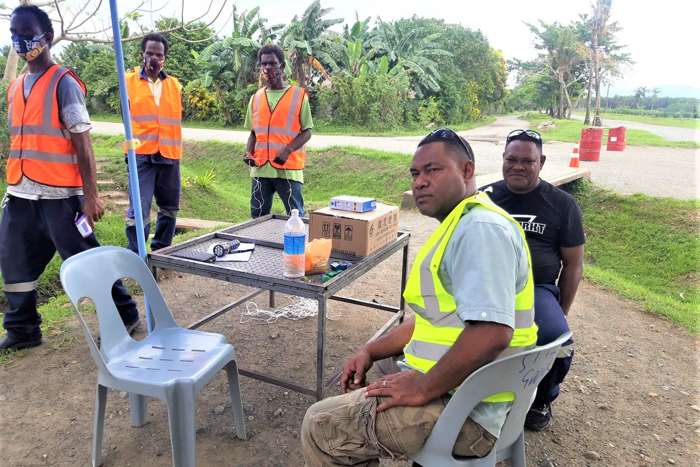 Harris Giusaga, GPPOL's Tetere Estate Manager, and GPPOL officers testing their procedures at the plains.