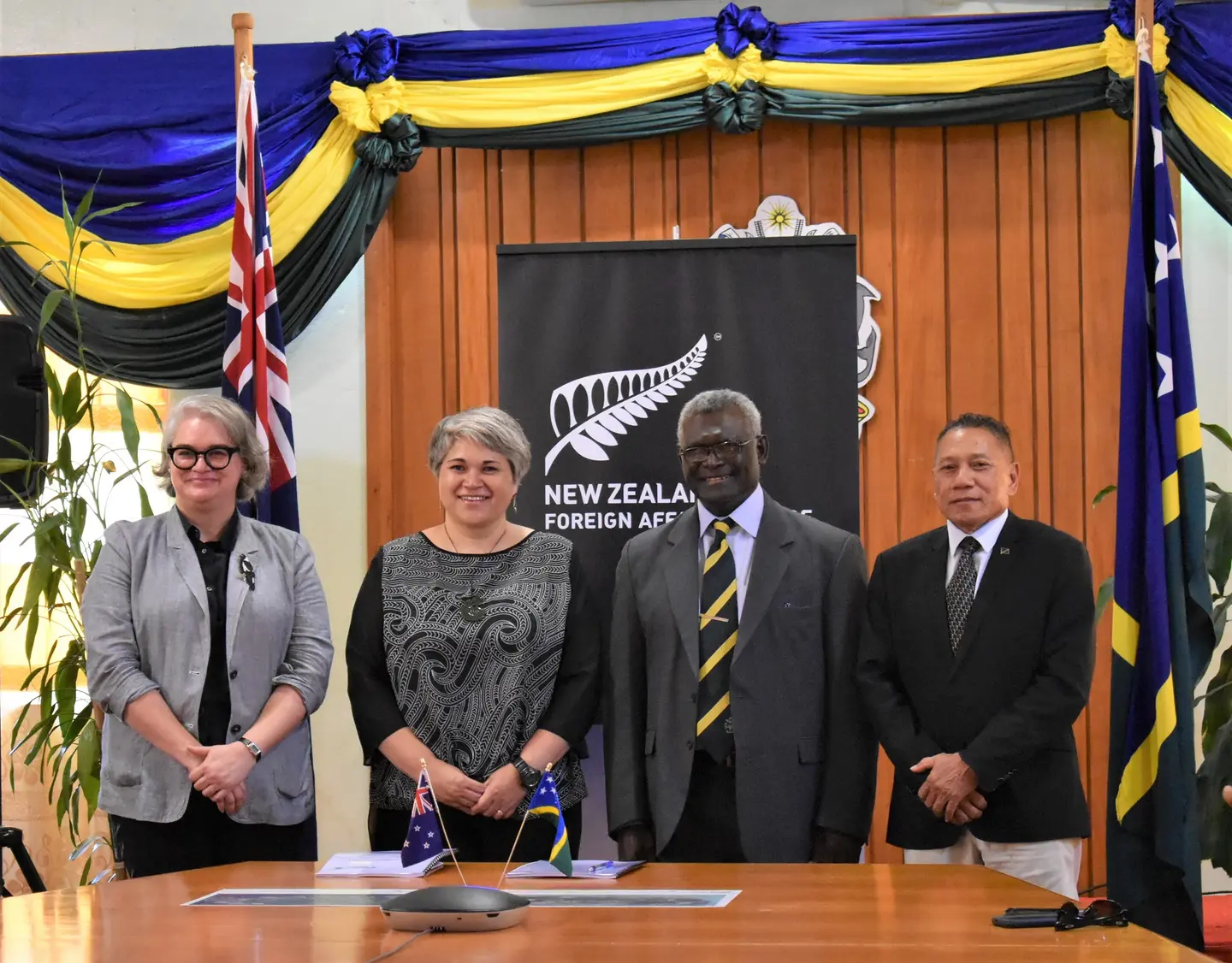 Acting Australian High Commissioner Sally-Anne Vincent, New Zealand High Commissioner Georgina Roberts, Prime Minister Manasseh Sogavare and Minister Peter Shanel Agovaka after the contract signing.