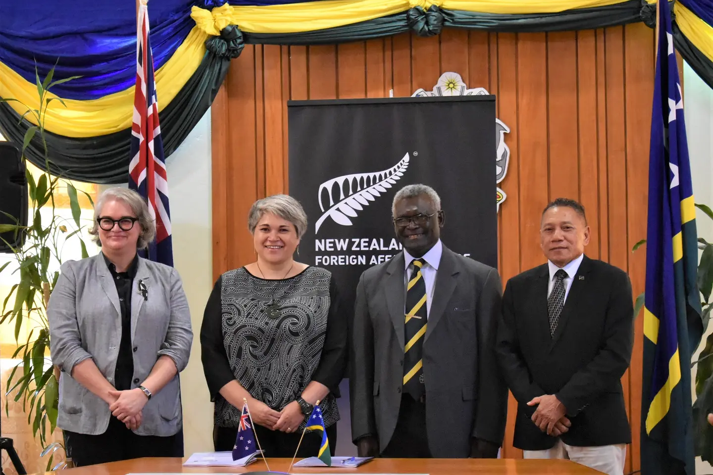 Acting Australian High Commissioner Sally-Anne Vincent, New Zealand High Commissioner Georgina Roberts, Prime Minister Manasseh Sogavare and Minister Peter Shanel Agovaka after the contract signing.
