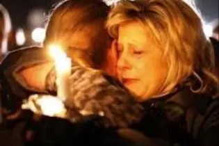 Candlelight vigils have been held throughout the United States following the massacre of 20 children and 6 adults.