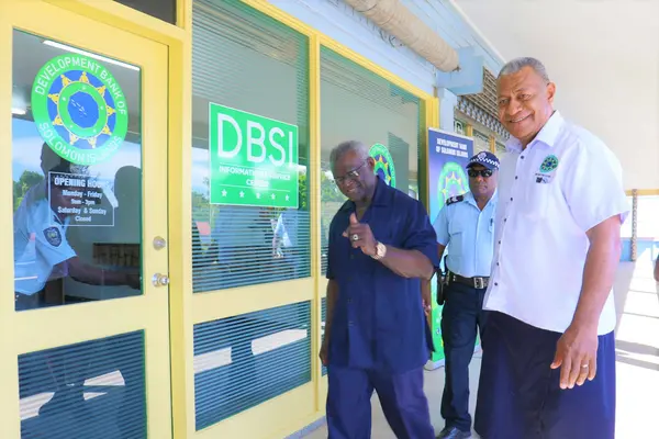A satisfied PM Sogavare gives a thumbs up to the camera as he is about to enter into the Service Center of the new DBSI.