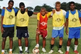 Fred Bala, centre, with team mates at the SIFF Academy.
