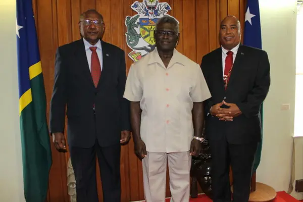 Prime Minister Sogavare, centre and Minister for Foreign Affairs and External Trade, Hon Milner Tozaka, left end, with the new Solomon Islands High Commissioner to Australia, His Excellency Colin David Beck.
