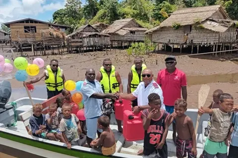 Back row from left-right. Mr. Avix Manehava Hospital Driver, RN Eric Zama Kia AHC, Mr. James Datho Kia AHC Driver and Mr. Jonathan Liloro Bauro FC & Advisor-Buala Hospital, Center-RN Joseph Patolo and DoN-s Martin Gavira Isabel Province and Kids of Vageza Area, Kia Village.