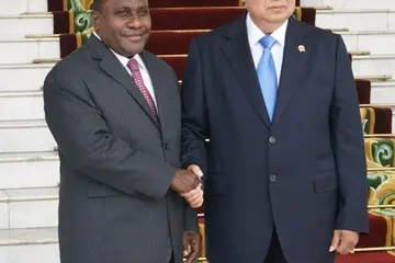 The Hon. Lilo greeted by the Indonesian President Susilo Bambang Yudhoyono upon arrival at the palace yesterday.