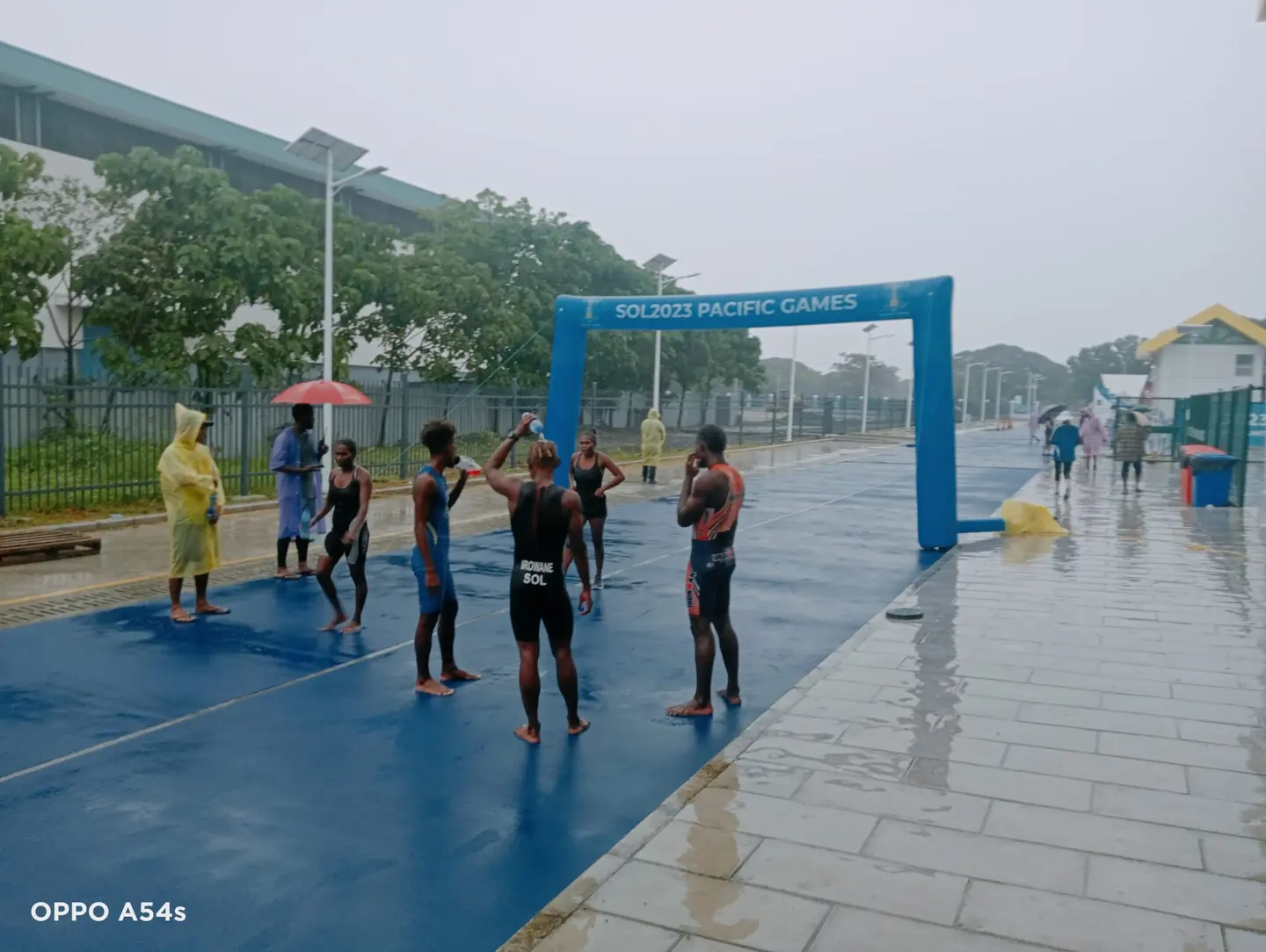 Athletes at the finishing line during the trial event.