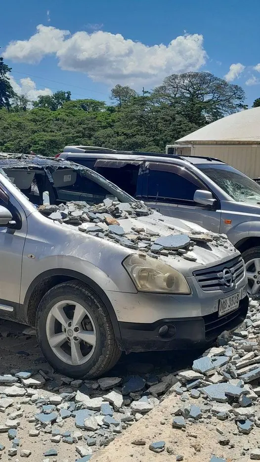 Vehicles damaged by fallen debris caused by the 7.3 magnitude earthquake.