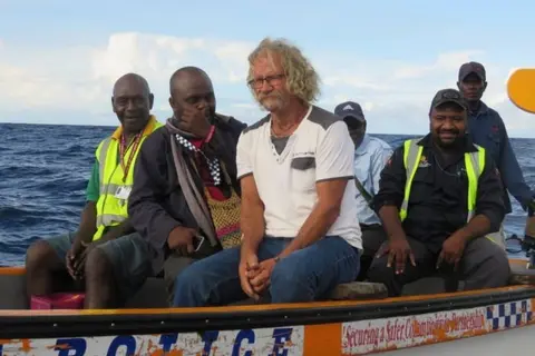 Retired civil engineer Tony McCracken was rescued by a China-bound transport freighter.