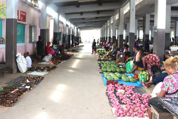 In Auki Market, 300 rural women market vendors travel daily to support family obligation such as education for their children, housing, social and cultural obligations.