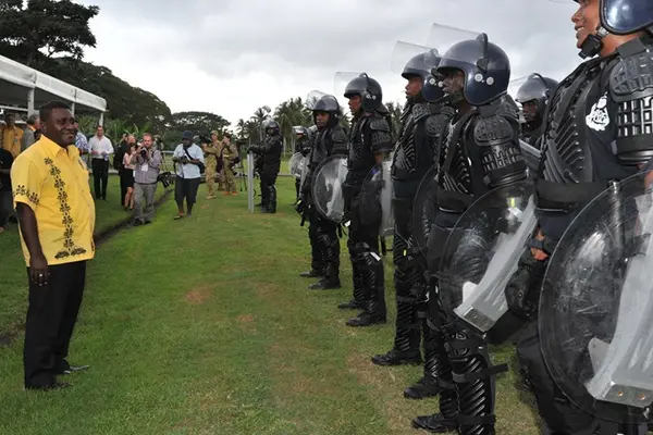 Hon. Gordon Darcy Lilo inspecting the Solomon Islands Police Response Team (PRT) at GBR.