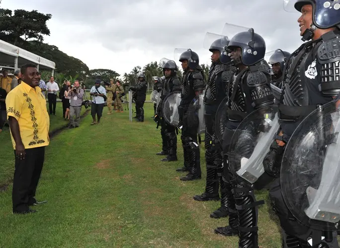 Hon. Gordon Darcy Lilo inspecting the Solomon Islands Police Response Team (PRT) at GBR.