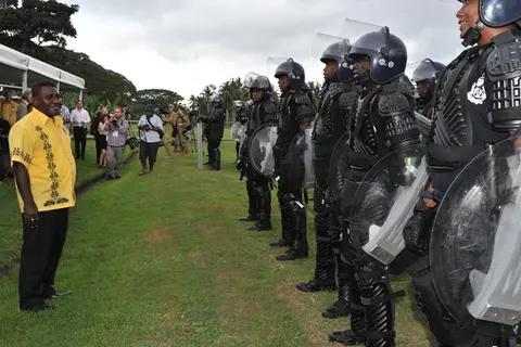 Hon. Gordon Darcy Lilo inspecting the Solomon Islands Police Response Team (PRT) at GBR.