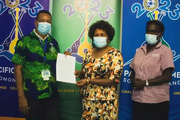 Games Organizing Committee (GOC) Senior Manager Sports Delivery Adrian Tuhanuku, Solomon Islands Netball Federation (SINFED) President Joy Kere, and SINFED General Secretary Doris Dolaisi after the signing of the MOU.