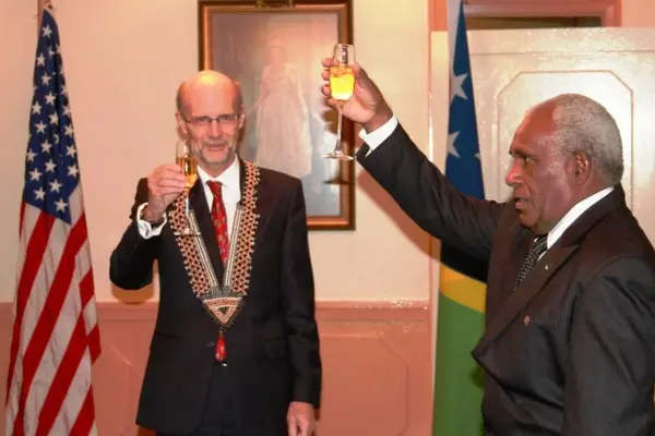 Sir Frank Kabui, the Solomon Islands Governor General proposes a toast to the people of United States while Ambassador North looks on.