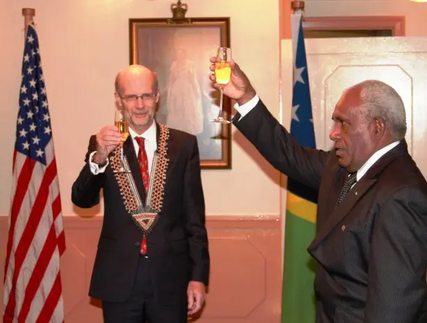 Sir Frank Kabui, the Solomon Islands Governor General proposes a toast to the people of United States while Ambassador North looks on.