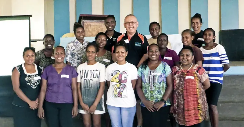 APTC Certificate III in Hospitality (multi-skill small accommodation) students with their trainer Mr William Hetherington and tutor, Ms Molina Kwato’o.