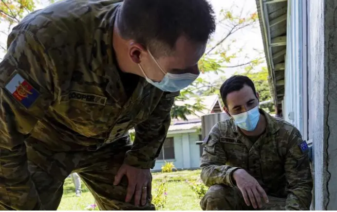 Australian Army engineers, Lieutenant Colonel Gavin Cooper and Captain Luke Staples inspect the National Referral Hospital in Honiara for damage.