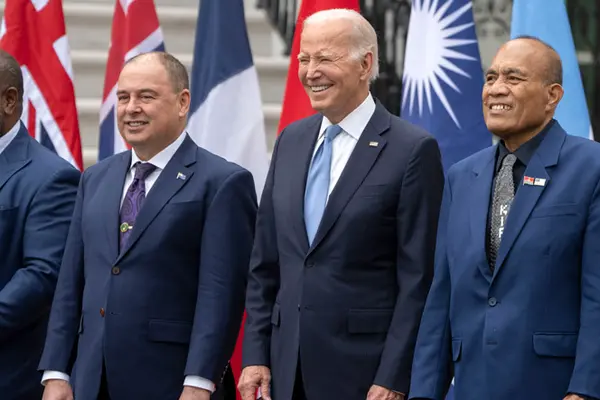 President Joe Biden, center, stands with Cook Islands Prime Minister Mark Stephen Brown, left, and Kiribati&#39;s President Taneti Maamau during a group photo with Pacific Islands Forum leaders at the White House in Washington.