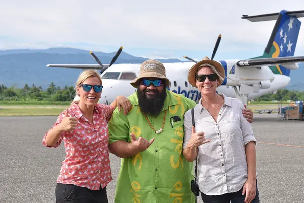 The Very Hungry Nomads (Martina on left and Rachel on right) with Tourism Solomons Team Leader Product Marketing, Garedd Porowai.