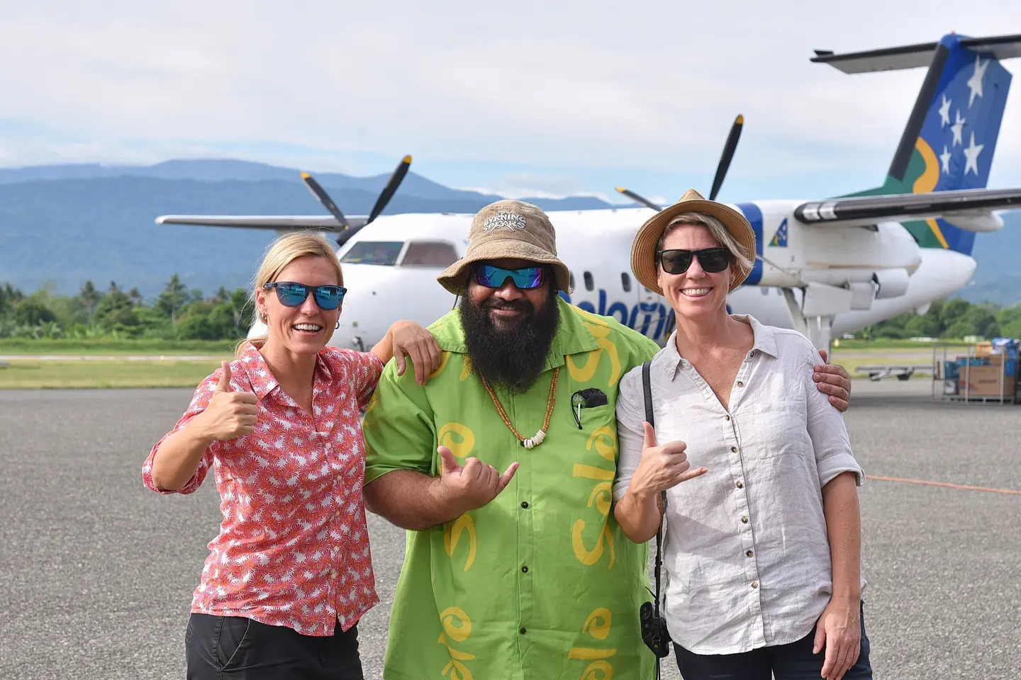 The Very Hungry Nomads (Martina on left and Rachel on right) with Tourism Solomons Team Leader Product Marketing, Garedd Porowai.